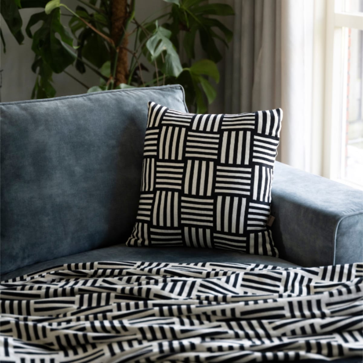 Comment rendre votre salon plus chaleureux avec des textiles ?